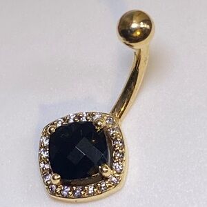 Black onyx and diamond 14 k naval ring.